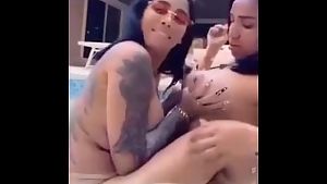 Two chicks and a pool kissing fingering and clapping big booties