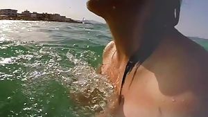 Topless at the beach: britney swallows big wet milf tits slow motion bounce