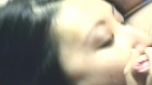 Brunette asian sucking on the fat dick of her man