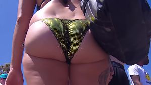 Big ass small thong milf beach voyeur bikini